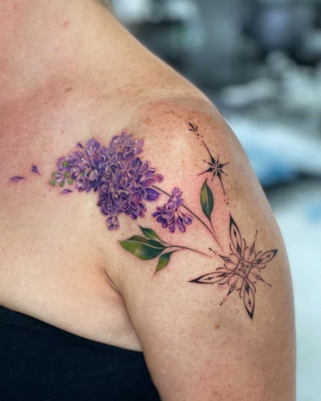 Best colour flower tattoo in Saskatchew