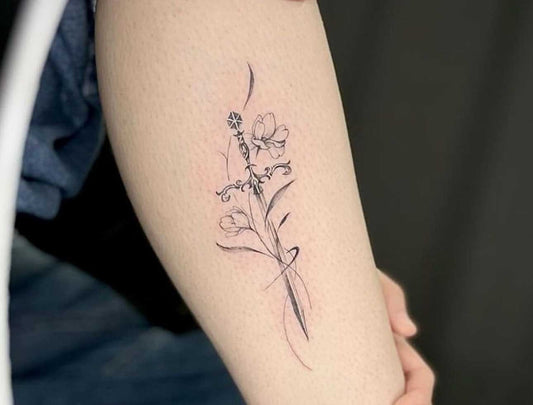 Fine line flower tattoo saskatoon